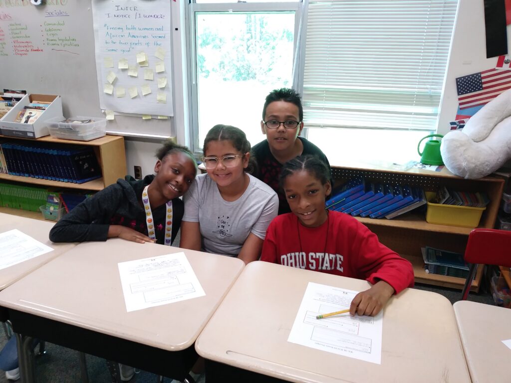 Students participate in the We 2 R Poets project at Hodge Road Elementary